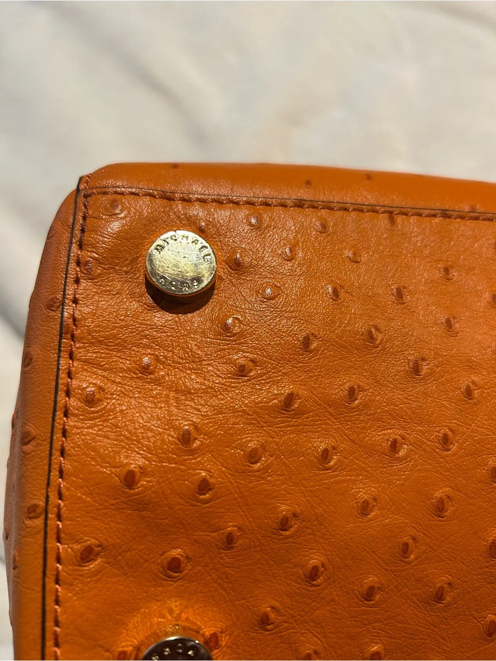 Michael Kors handles gold